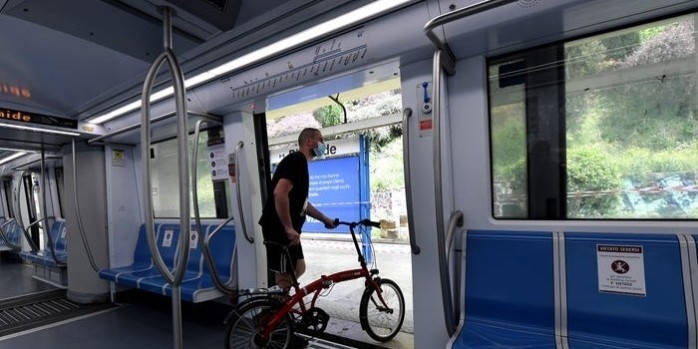 Stickers call for social distancing on a subway car in Rome, Italy, on May 17, 2020.